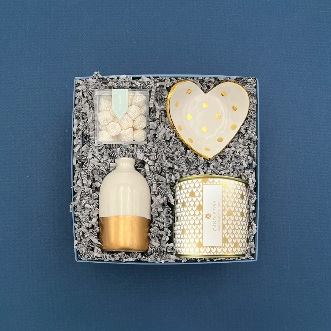 Celebrate Gift Box with white and gold vase, heart ring dish, Champagne Bubbles gummies, and Candlefish candle