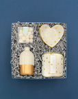 Celebrate Gift Box with white and gold vase, heart ring dish, Champagne Bubbles gummies, and Candlefish candle