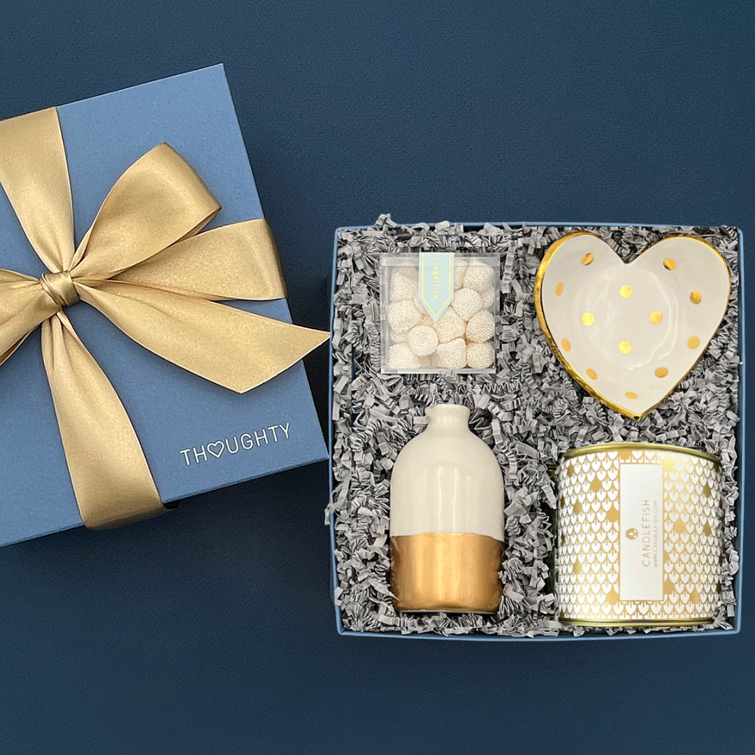 Elegant gift box for engagements, retirements, or special occasions with vase, jewelry dish, candy, and candle