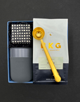 Client or housewarming gift with fair trade coffee, chocolate caramels, and stylish coffee accessories