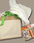 College Care package set with a white blanket, reusable tote bag and snacks