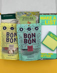Exam Cram Kit college care package with sticky notes, notepad, and study snacks in a white gift box