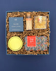 Fresh Start self care gift box with candle, orange spice soap, shower steamer, lemon candy and tangerine matches