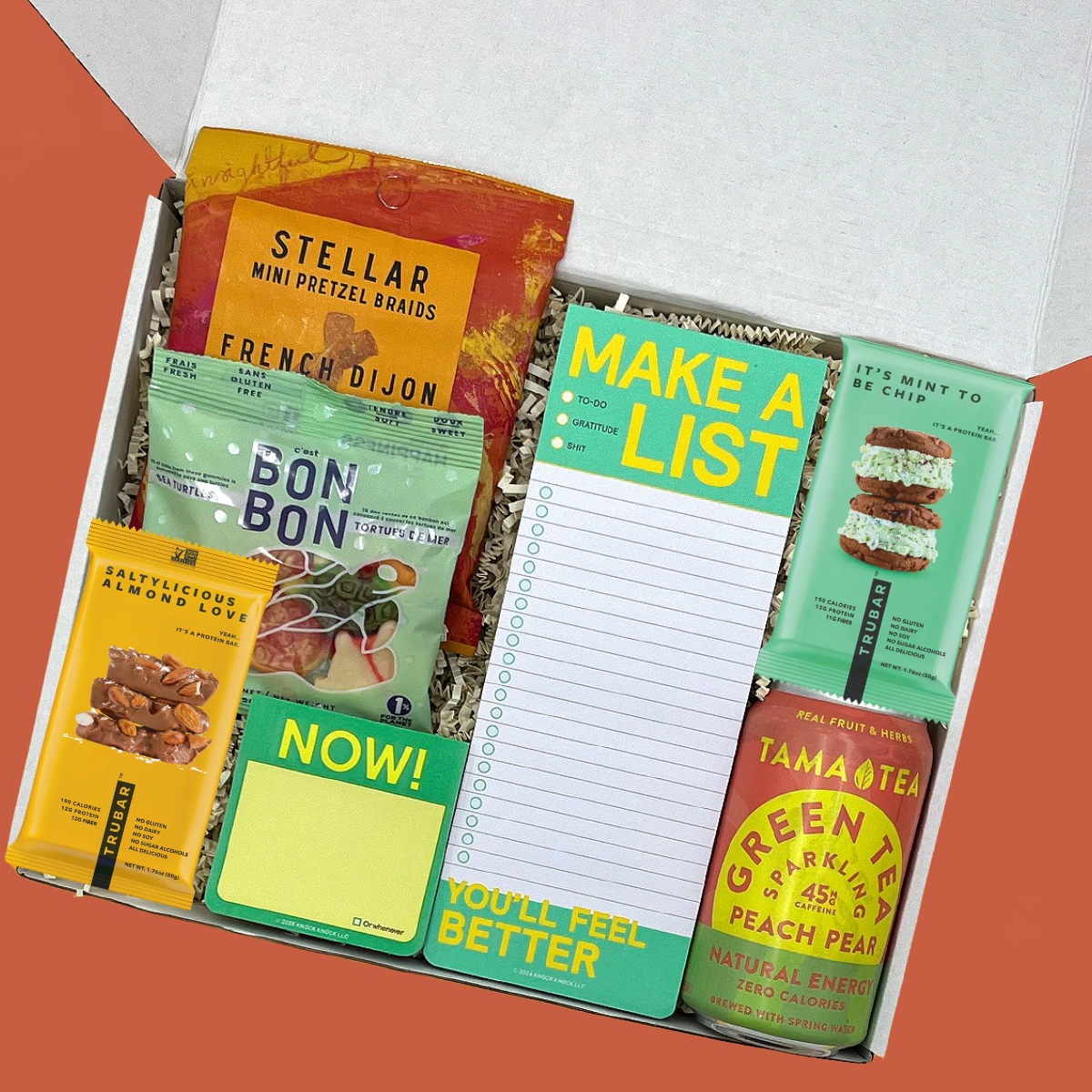 Exam Cram Kit with plant-based snacks, fruity gummies, pretzel braids, and peach pear green tea