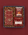 Good Tidings holiday gift box with chocolate chip cookies, spicy candied pecans, and sea salt caramels.