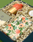 Just Because Gift Box with floral-wrapped cookies, lip balm, decorative vase, and sweet gummies