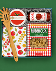 Pasta Night gift box with lumache pasta, tomato sauce, tomato kitchen towel, bamboo pasta spoon, and tomato coasters.