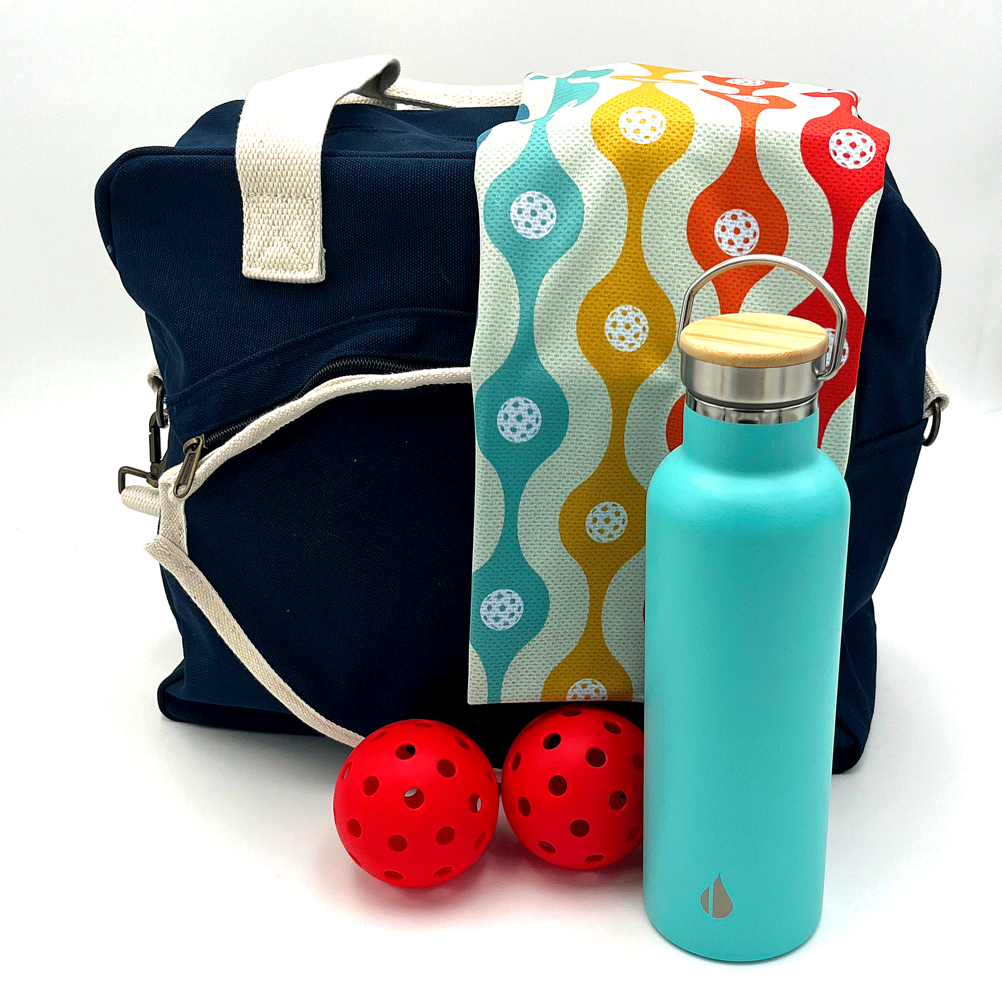 Pickleball-themed gift bag for enthusiasts with water bottle, towel, and balls
