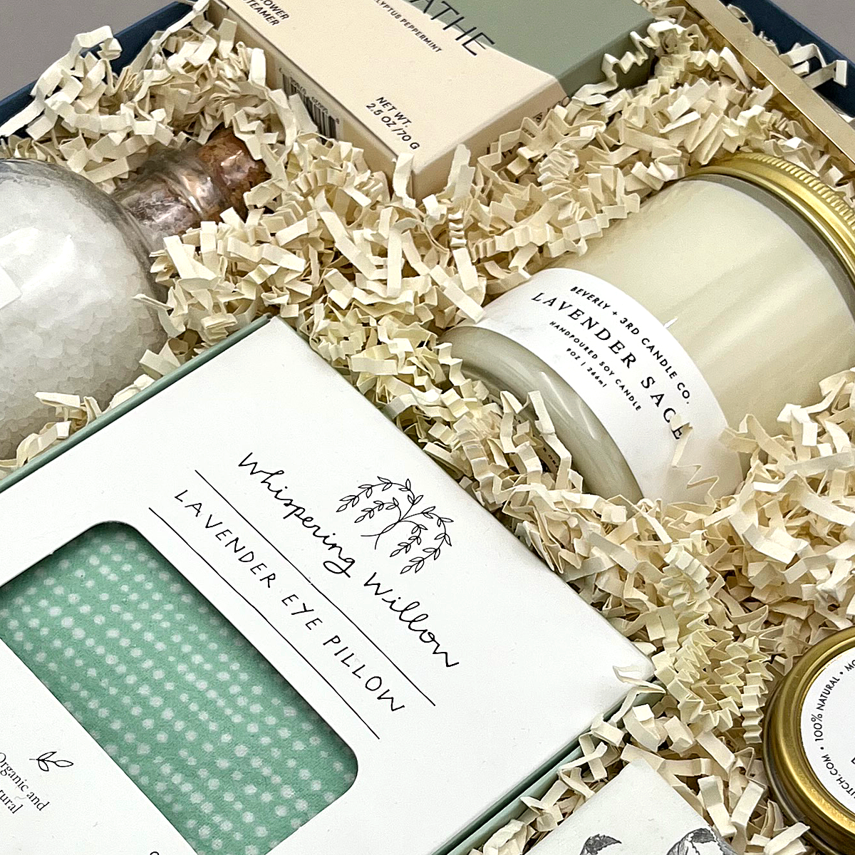 Relaxation gift set with shower steamer, champagne gummies, and soothing essentials