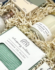Relaxation gift set with shower steamer, champagne gummies, and soothing essentials