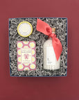 Gift set with spa products in a decorative box on a red background
