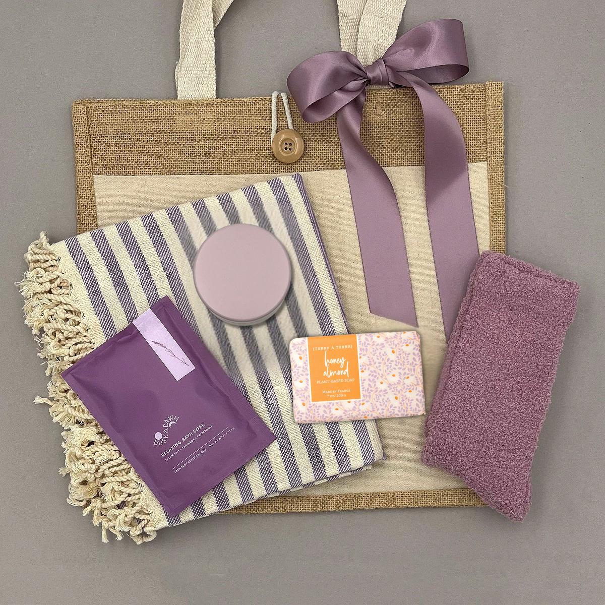 Spa Tote gift with Turkish towel, bath soak, cozy socks, soap, and candle