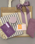 Spa Tote gift with Turkish towel, bath soak, cozy socks, soap, and candle