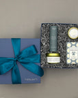 Thoughtful self-care gift including Peony Fields candle, essential oils, and French pear soap