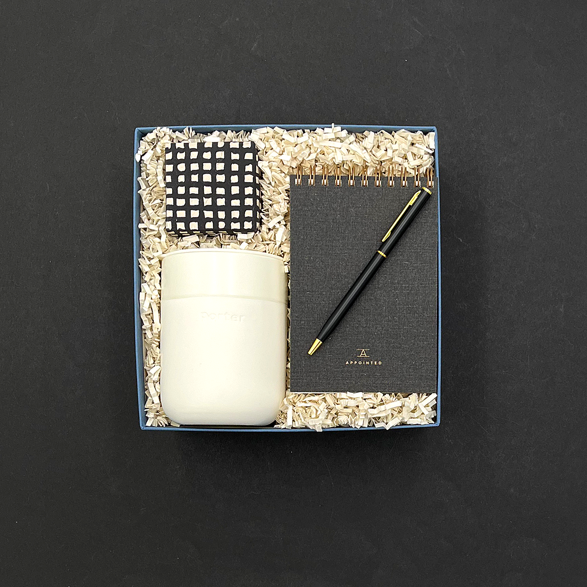 HDesk gift box with stylish work essentials and sweet treats for employees or clients