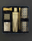 Five O’Clock Gift Box with gold cocktail shaker, lowball glasses, jigger, bar spoon, playing cards.