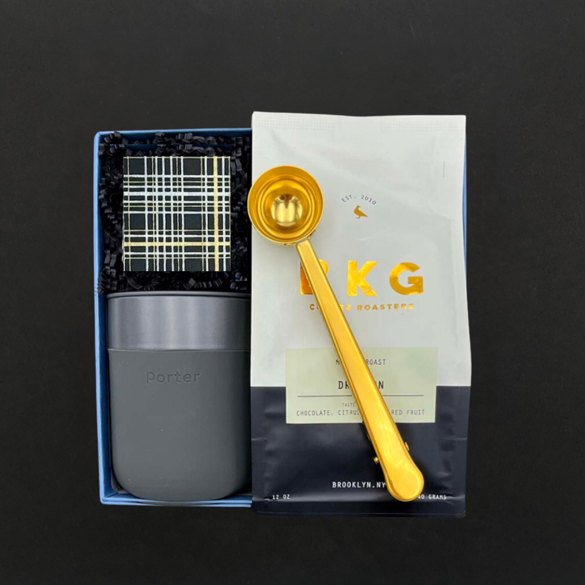 Coffee Break Gift Box with Dragoon artisan coffee, ceramic tumbler, dark chocolate caramels, and gold coffee clip