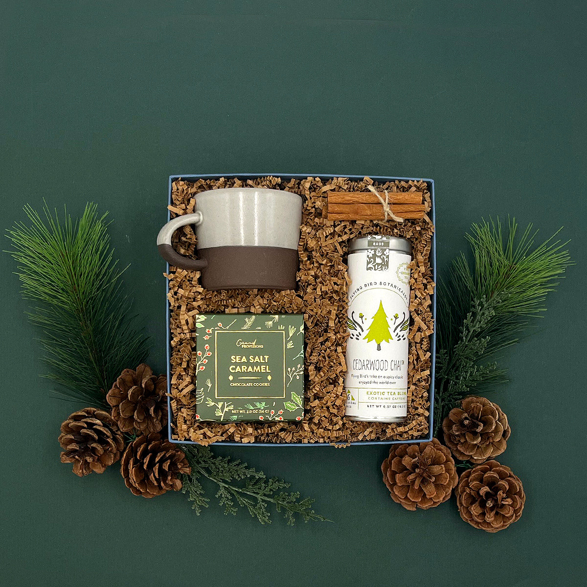 Holiday Sea Salt Caramel Cocoa Cookies and Cedarwood Chai Tea inside The Fraser Gift Box.