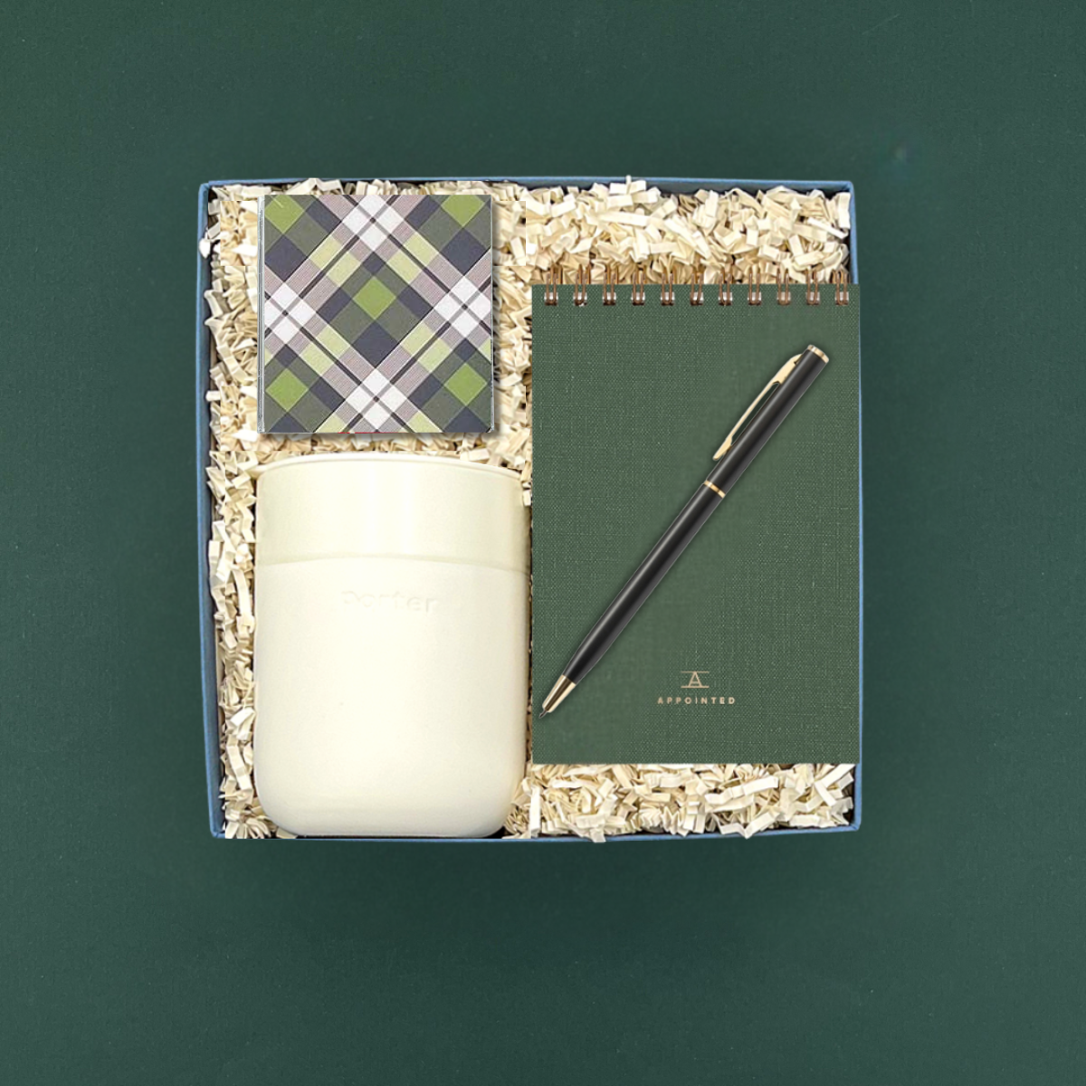 Good Tidings Gift Box with tumbler, notebook, Sugarfina sea salt caramels, and gold pen.