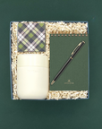 Good Tidings Gift Box with tumbler, notebook, Sugarfina sea salt caramels, and gold pen.