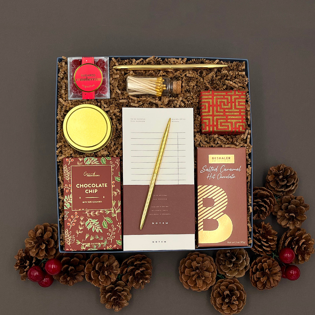 The Hearth Gift Box, a festive holiday gift set with gourmet delicacies and warm comforts.