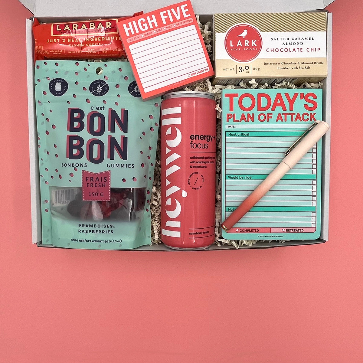 High Five Kit college student care package with sticky notes, snacks, and energy drink in a gift box
