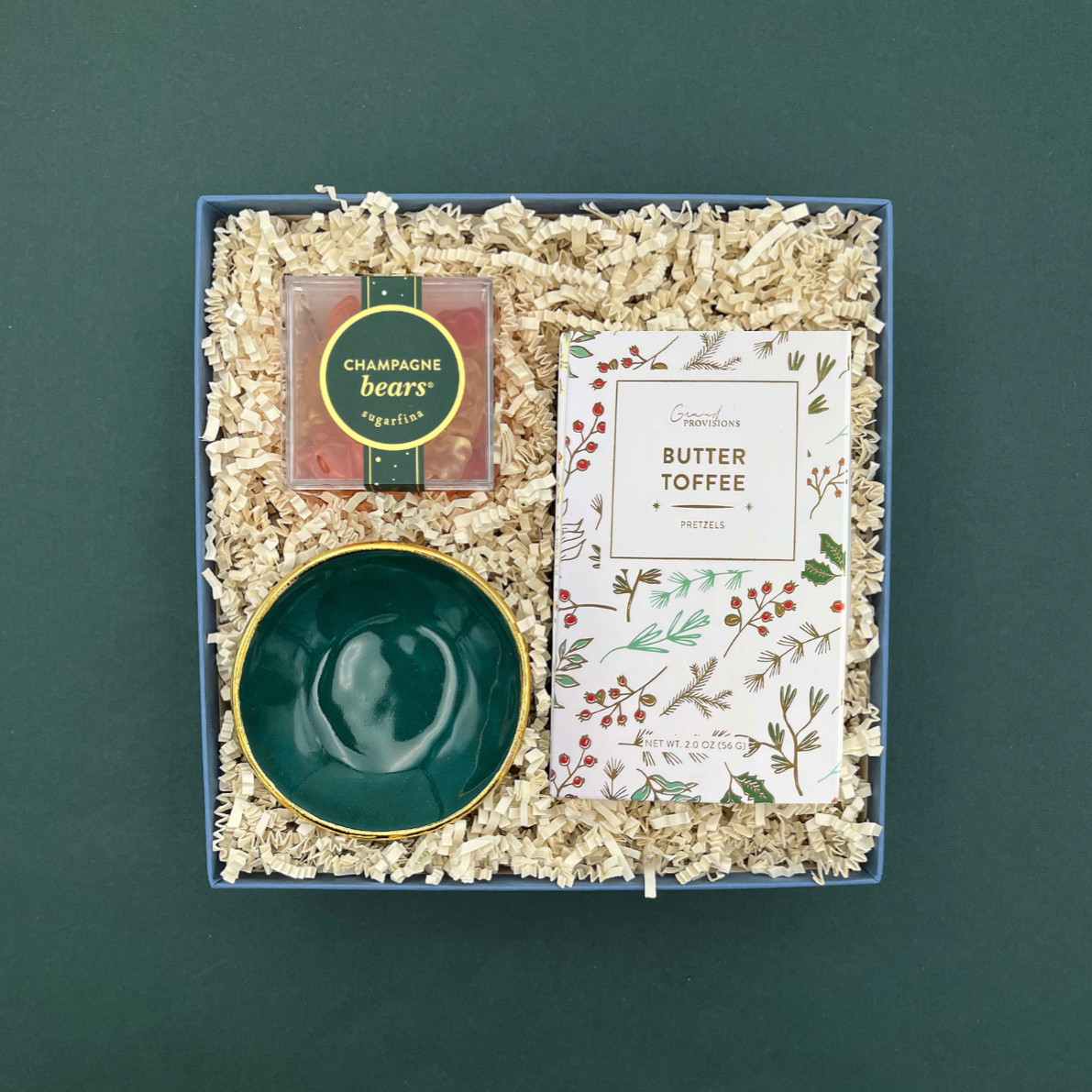 Holiday Cheer Gift Box with Champagne Bears, emerald ring dish, and butter toffee pretzels.