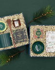 Elegant Holiday Cheer Gift Box and Tea Time with emerald green and gold accents.