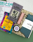 Mood boost gift box for college students with signature label and handwritten note card.
