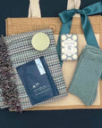 Spa Tote gift with Turkish towel, bath soak, cozy socks, soap, and candle