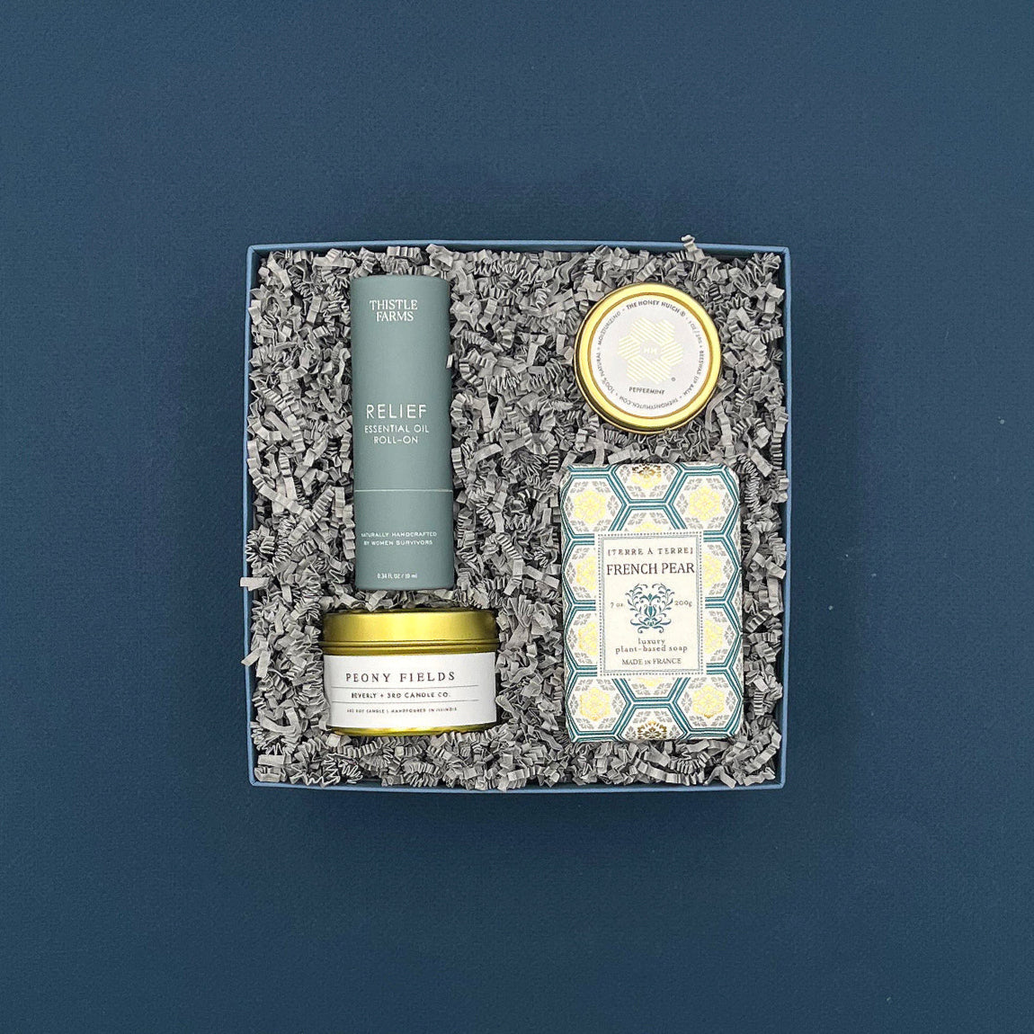 Self care gift box against a dark blue background